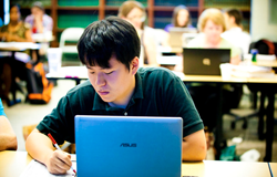 Student at work with a laptop