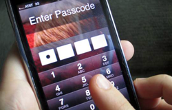 Closeup photo of a password being entered on an iPhone