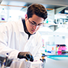 Photo of a student in a science lab